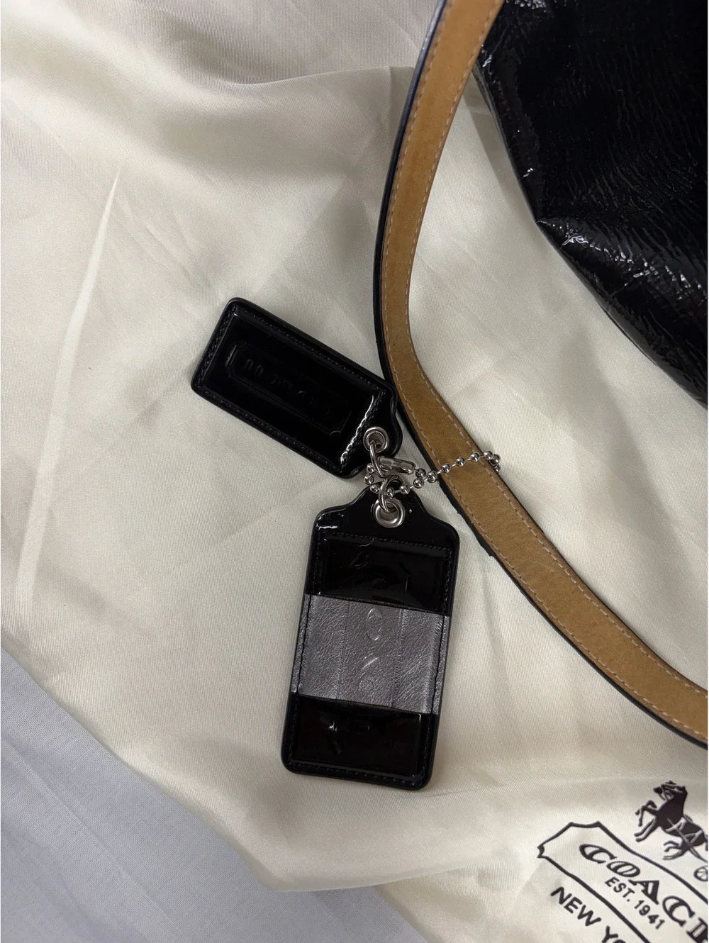 Coach Black Poppy Daisy Liquid Gloss Bag with Pink Lining. Dust Bag And Tags